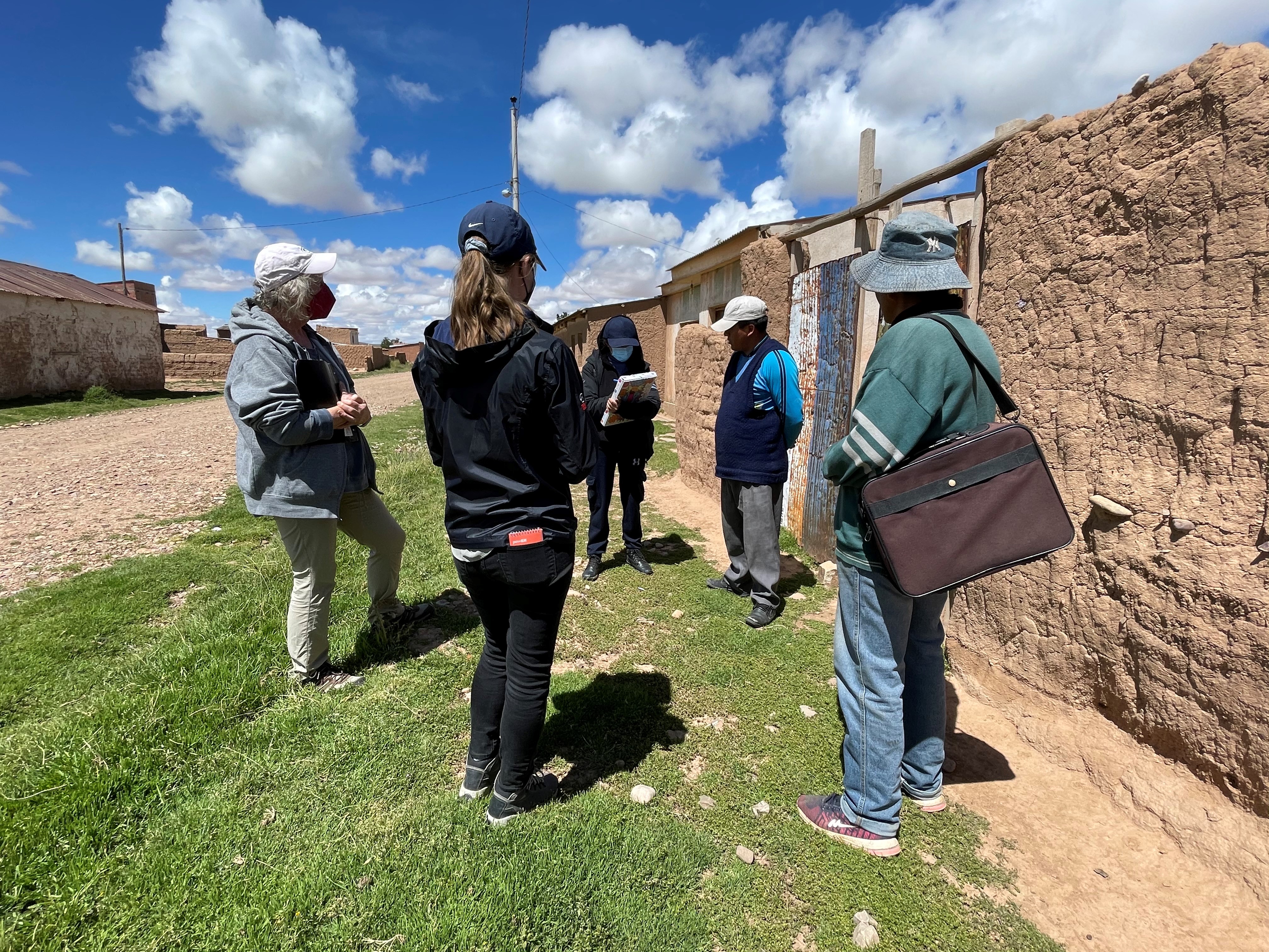 ARI researchers Alexandra Timmons (foreground) and Ann-Perry Witmer (on left) visit residents of Janko Kollo accompanied by FIEA engineer Xiomara Echeverria to learn more about indigenous practices and community technical needs.