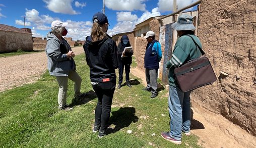 ARI researchers Alexandra Timmons (foreground) and Ann-Perry Witmer (on left) visit residents of Janko Kollo accompanied by FIEA engineer Xiomara Echeverria to learn more about indigenous practices and community technical needs.